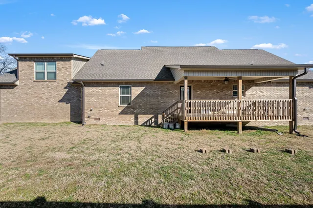 a house view with a backyard space