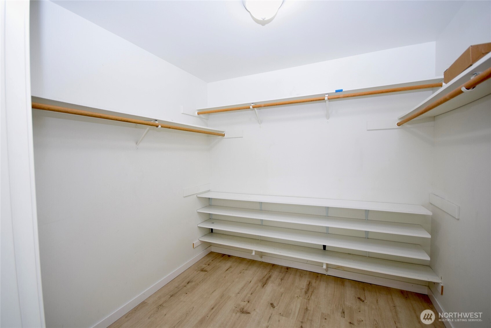 71 John Carl Road Sequim, WA 98382 - Photo 17 of 37 a view of walk in closet with empty racks