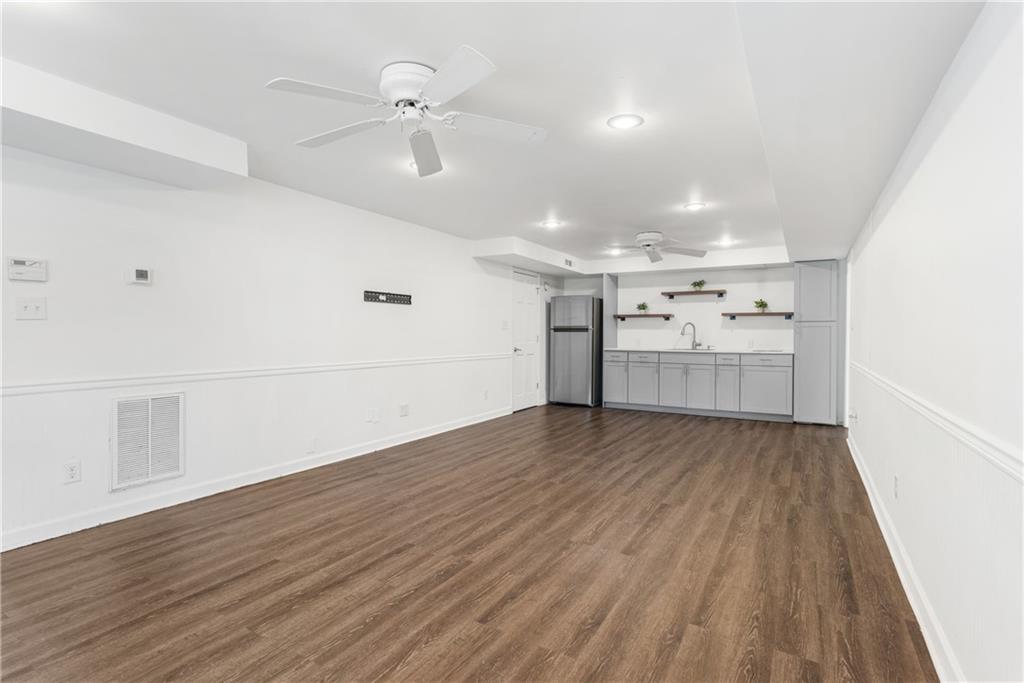 413 Sassafras Road Roswell, GA 30076 - Photo 35 of 67 wooden floor in an empty room with a window