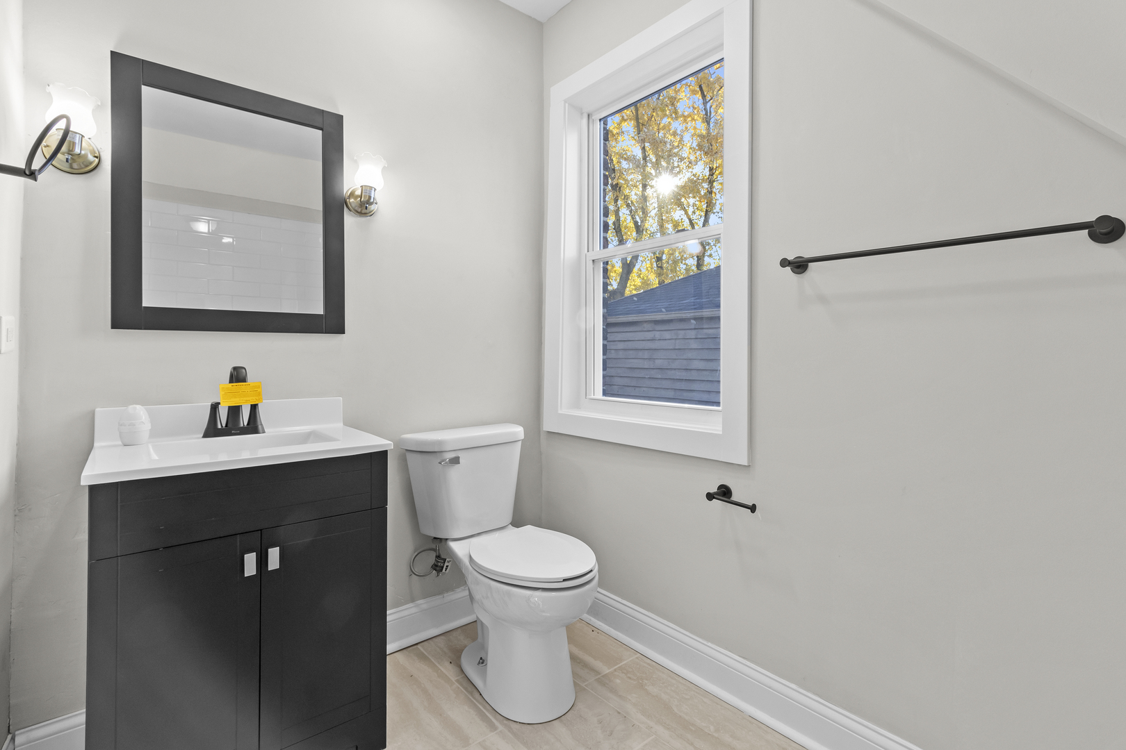 727 Selborne Road Riverside, IL 60546 - Photo 7 of 15 a bathroom with a toilet sink and mirror