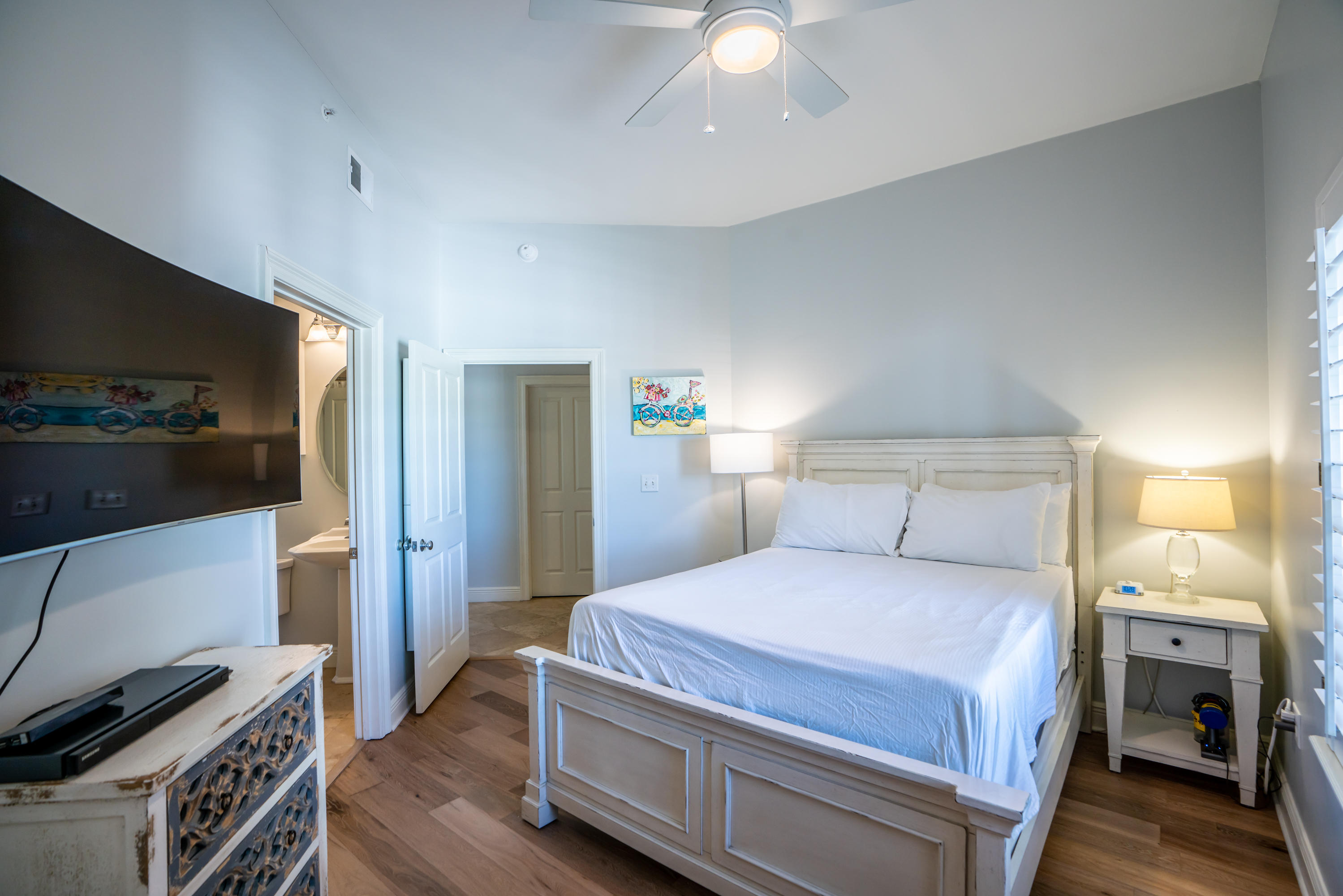 3880 East County Highway 30A, Unit 402 Santa Rosa Beach, FL 32459 - Photo 25 of 62 a bedroom with a bed and a flat screen tv