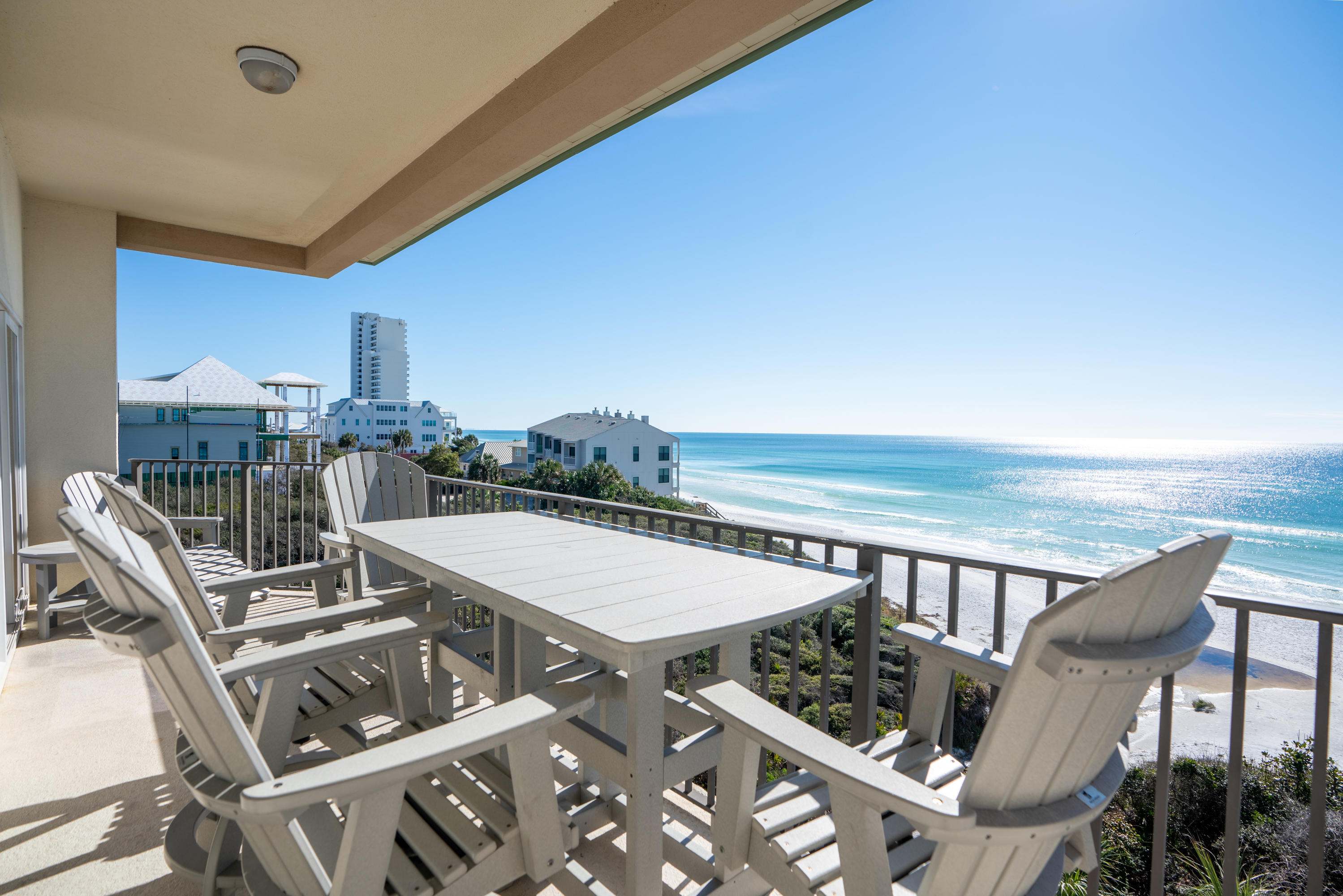 3880 East County Highway 30A, Unit 402 Santa Rosa Beach, FL 32459 - Photo 33 of 62 a view of a balcony with chairs