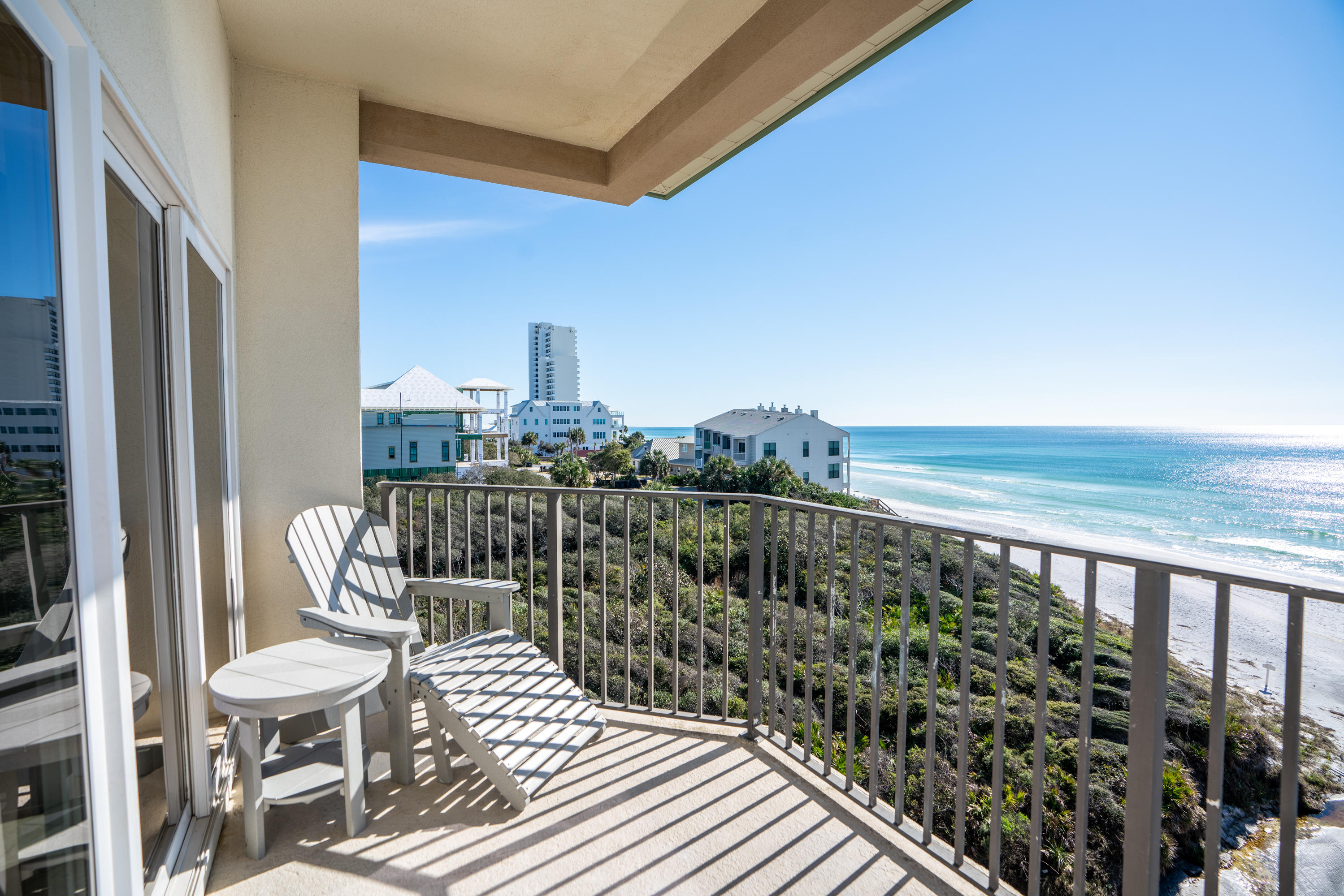 3880 East County Highway 30A, Unit 402 Santa Rosa Beach, FL 32459 - Photo 34 of 62 a view of a balcony with chair and table