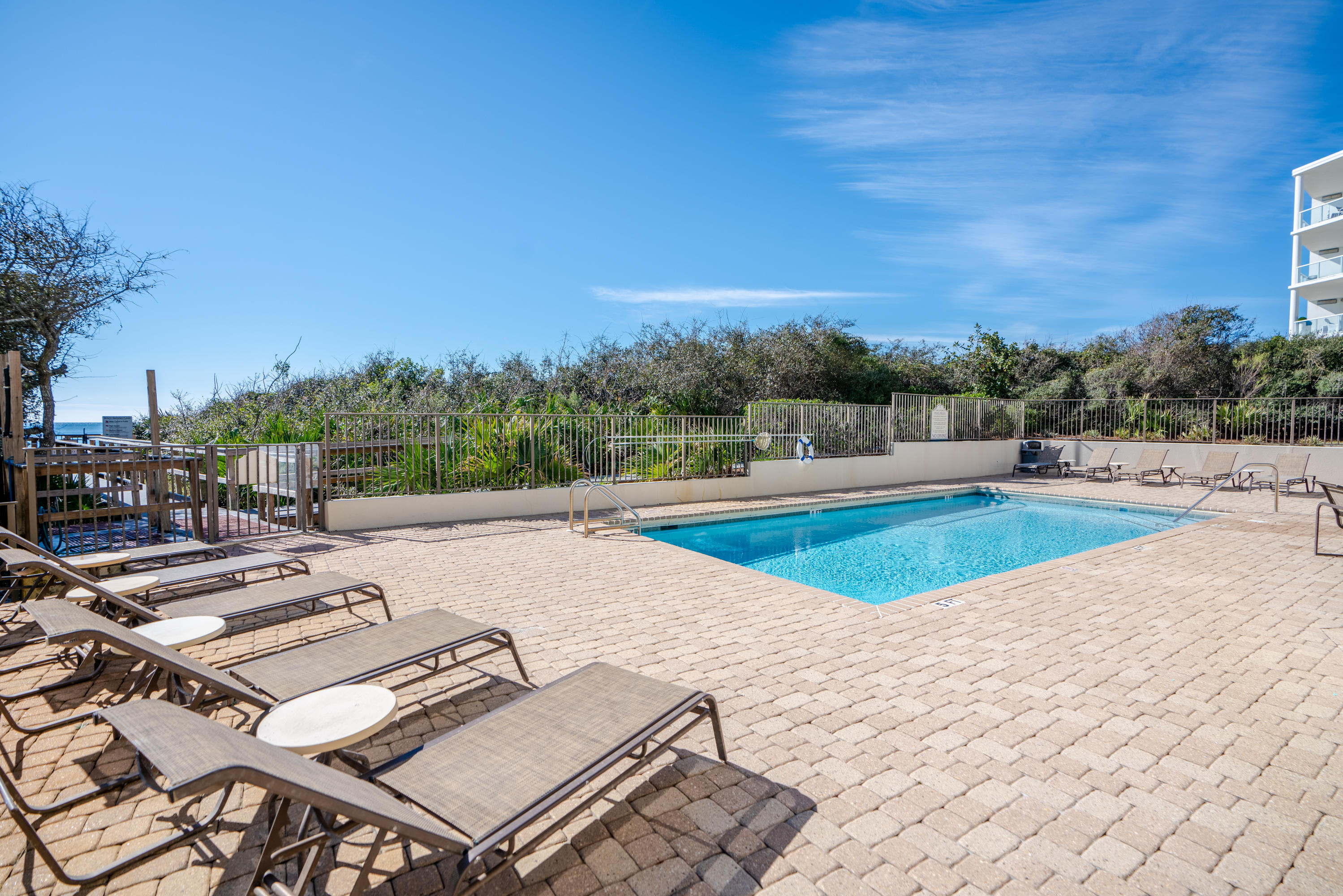 3880 East County Highway 30A, Unit 402 Santa Rosa Beach, FL 32459 - Photo 44 of 62 a view of a swimming pool with an outdoor seating
