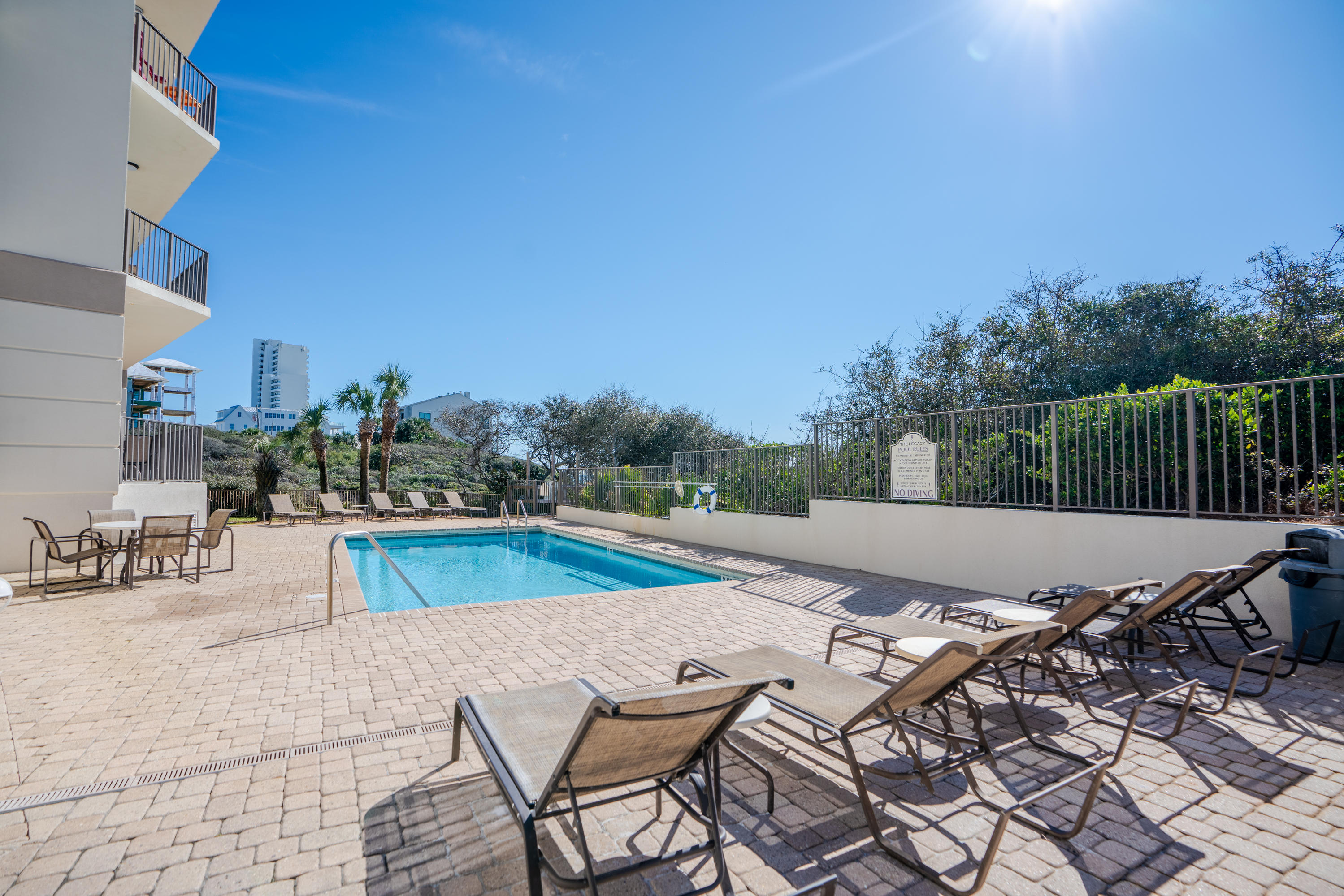 3880 East County Highway 30A, Unit 402 Santa Rosa Beach, FL 32459 - Photo 45 of 62 a view of swimming pool with outdoor seating and plants