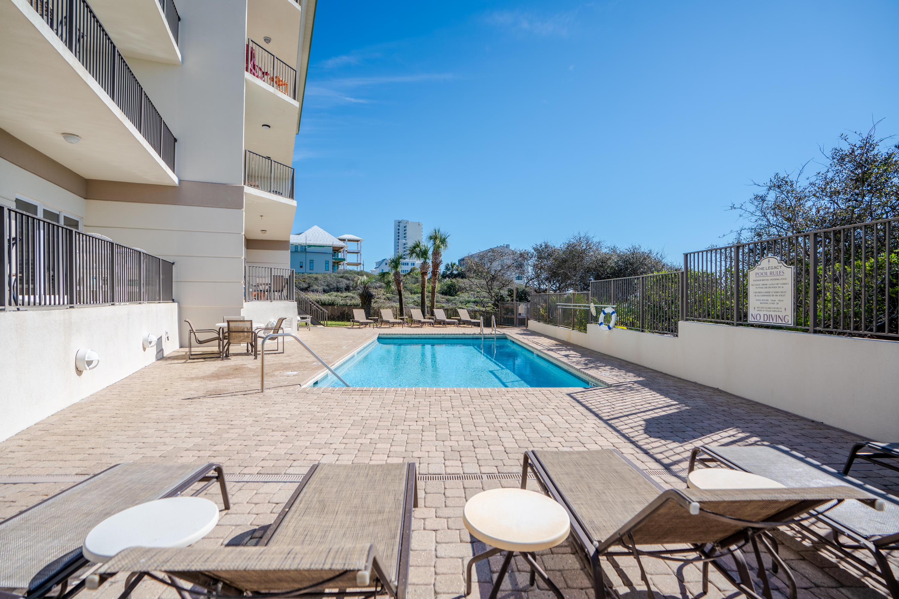 3880 East County Highway 30A, Unit 402 Santa Rosa Beach, FL 32459 - Photo 46 of 62 a view of house with swimming pool outdoor seating