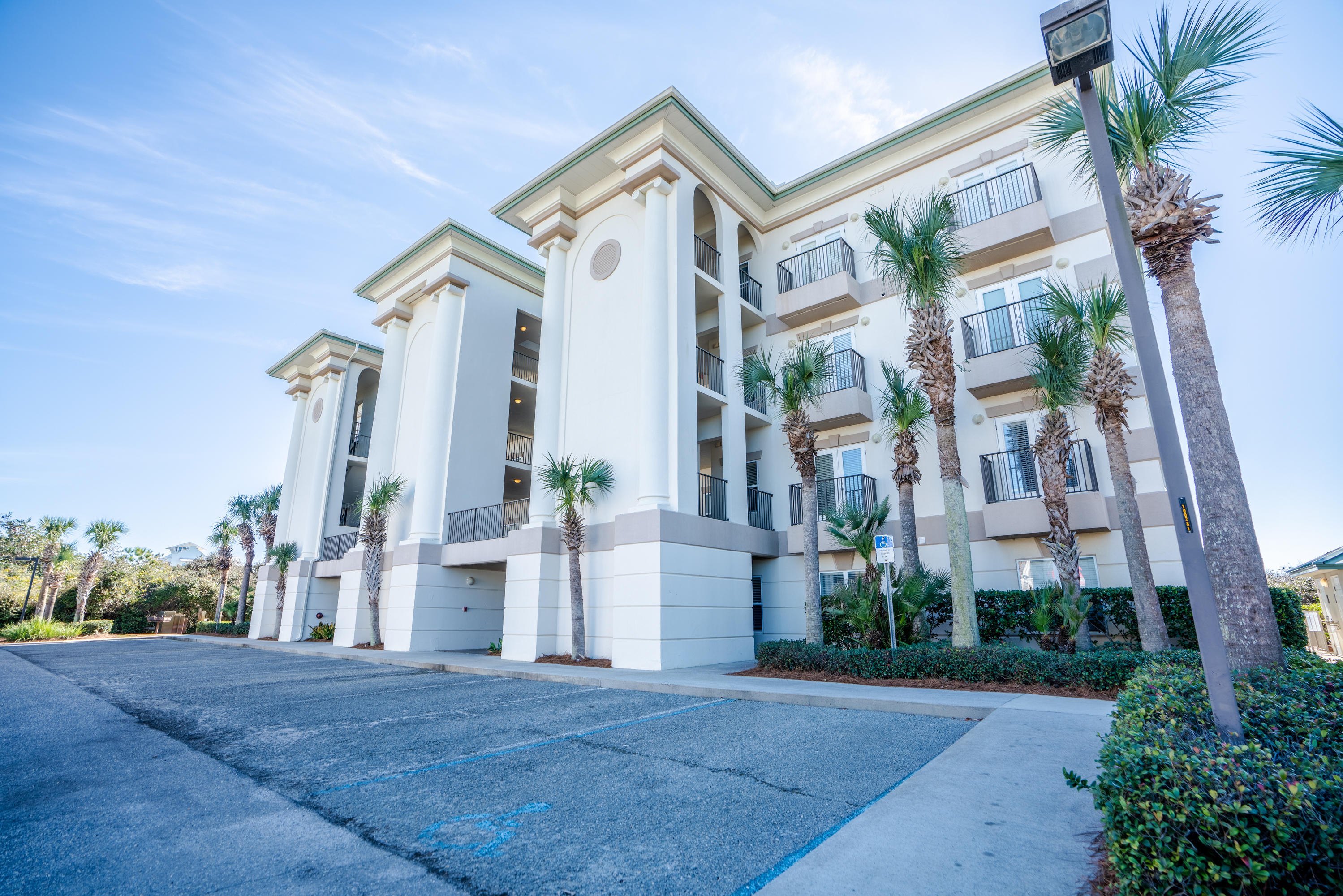 3880 East County Highway 30A, Unit 402 Santa Rosa Beach, FL 32459 - Photo 62 of 62 front view of a building with a yard