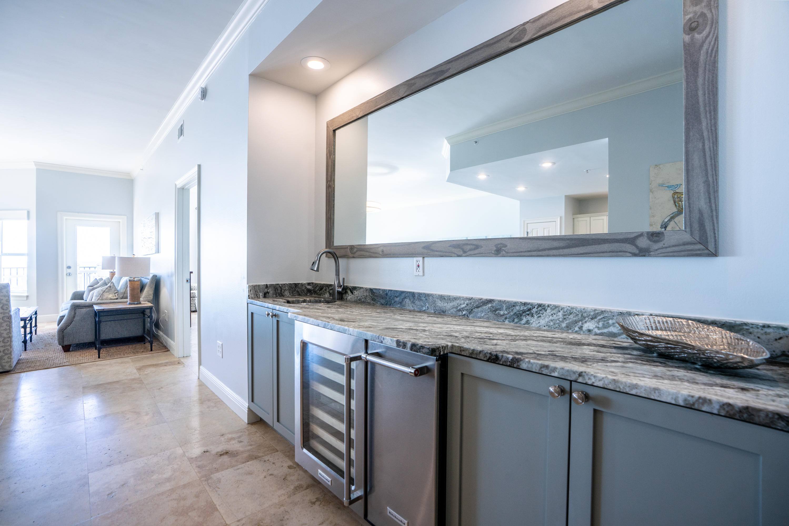 3880 East County Highway 30A, Unit 402 Santa Rosa Beach, FL 32459 - Photo 7 of 62 a view of a kitchen with a sink and a dishwasher