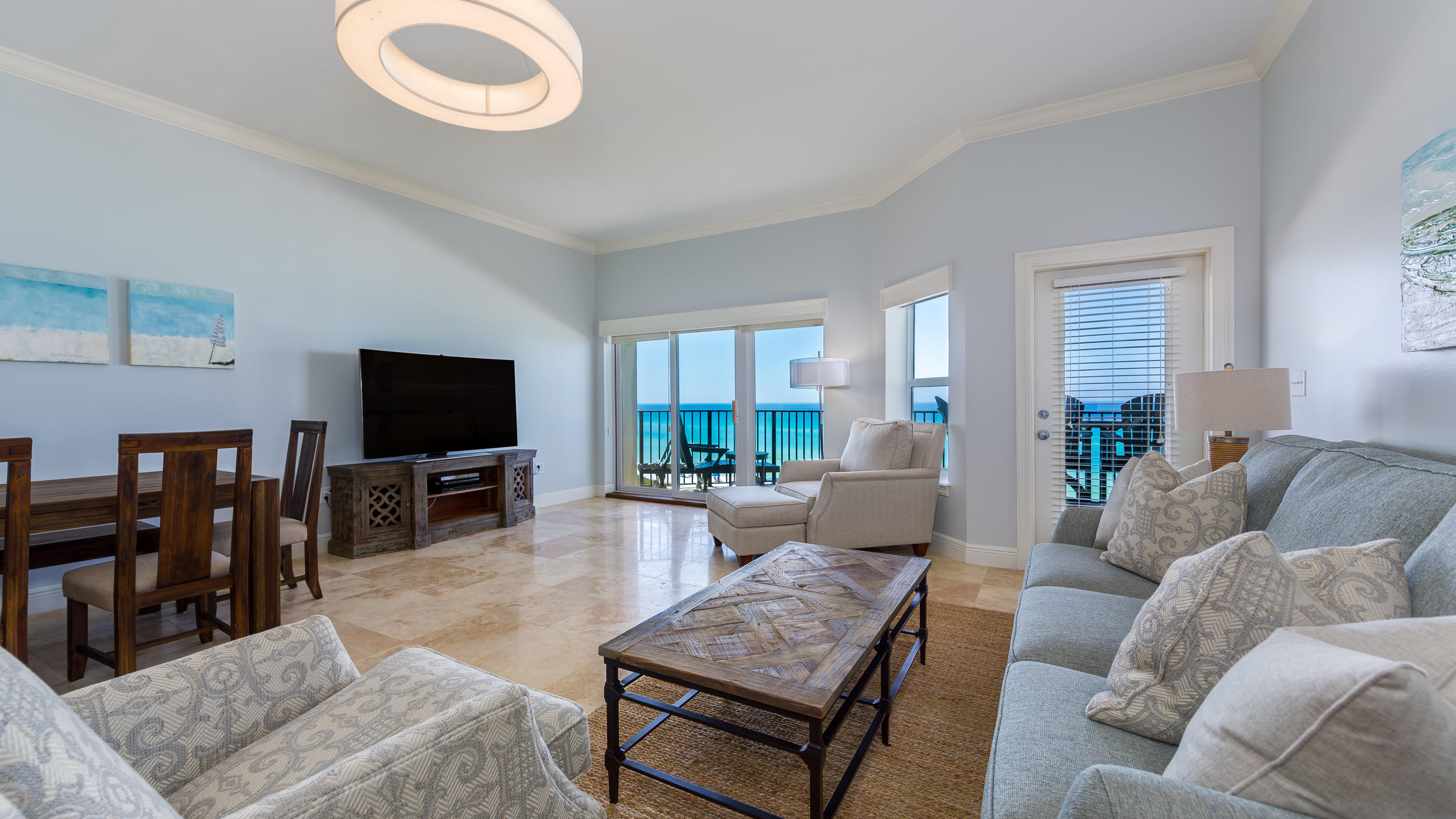 3880 East County Highway 30A, Unit 402 Santa Rosa Beach, FL 32459 - Photo 9 of 62 a living room with furniture and a flat screen tv