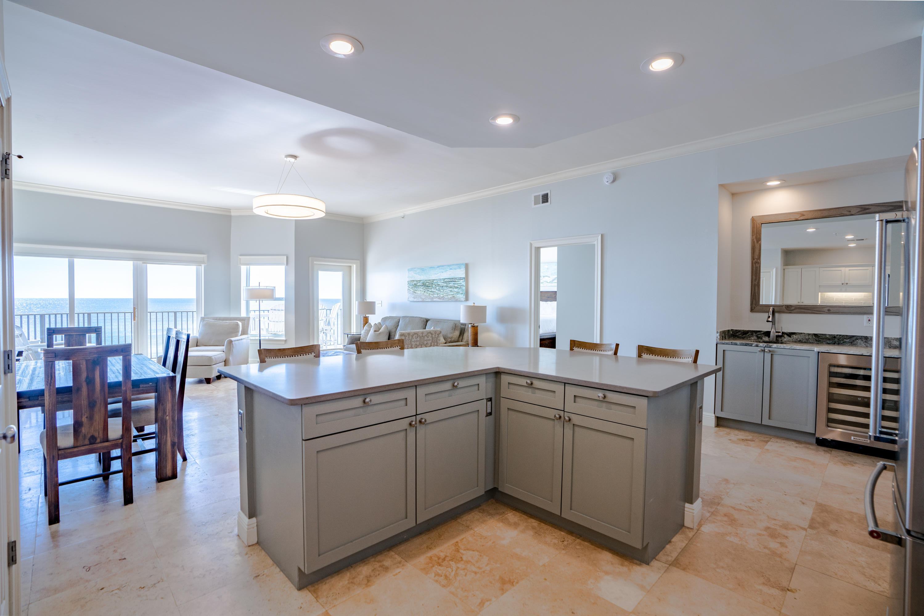 3880 East County Highway 30A, Unit 402 Santa Rosa Beach, FL 32459 - Photo 10 of 62 a kitchen with lots of counter top space and dining table