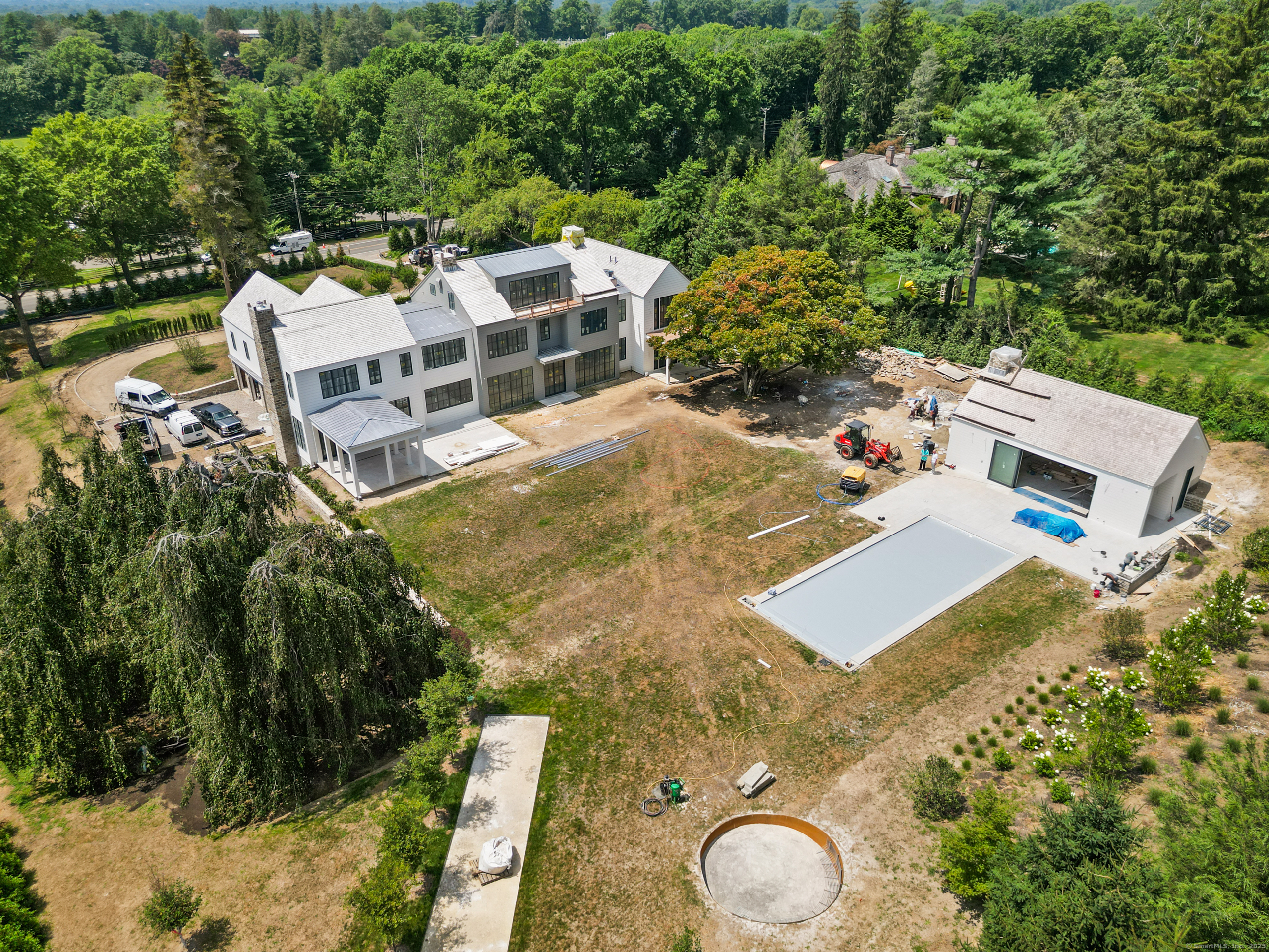 382 North Street Greenwich, CT 06830 - Photo 15 of 18 aerial view of a house with swimming pool and large trees