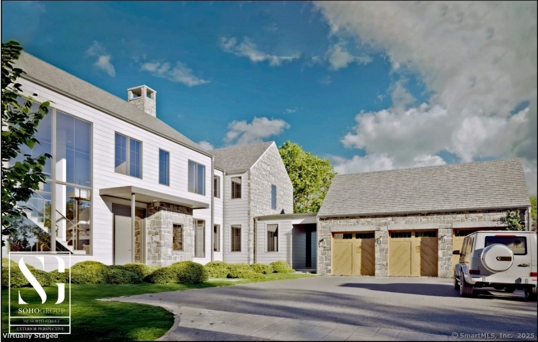 382 North Street Greenwich, CT 06830 - Photo 17 of 18 a front view of a house with garden