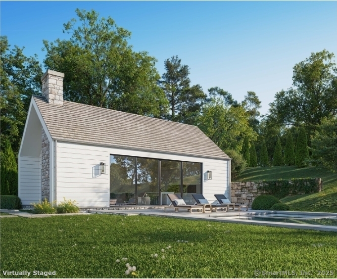 382 North Street Greenwich, CT 06830 - Photo 6 of 18 a front view of house with yard patio and green space