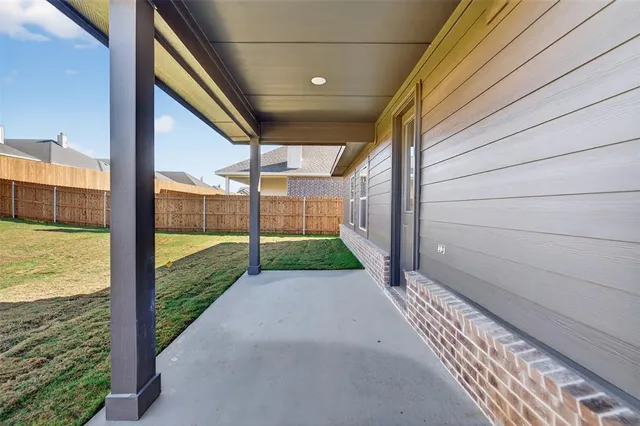 a view of a porch with a yard