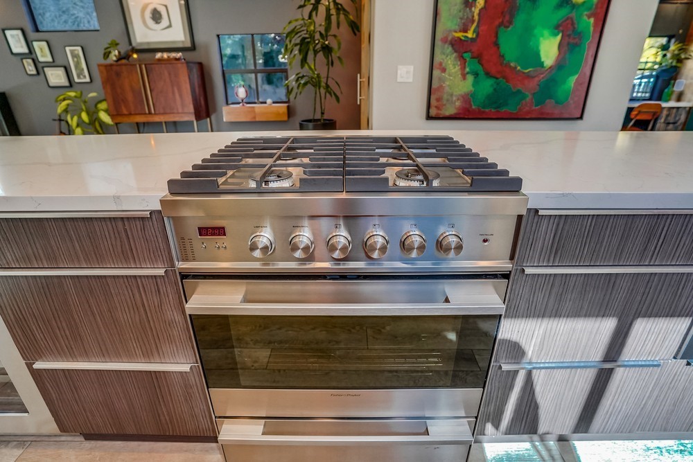 1051 Prospect Avenue Long Beach, CA 90804 - Photo 13 of 56 a stove top oven sitting inside of a kitchen