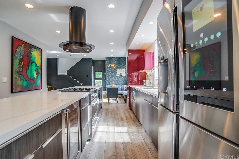 1051 Prospect Avenue Long Beach, CA 90804 - Photo 17 of 56 a very nice looking room with a large window and stainless steel appliances