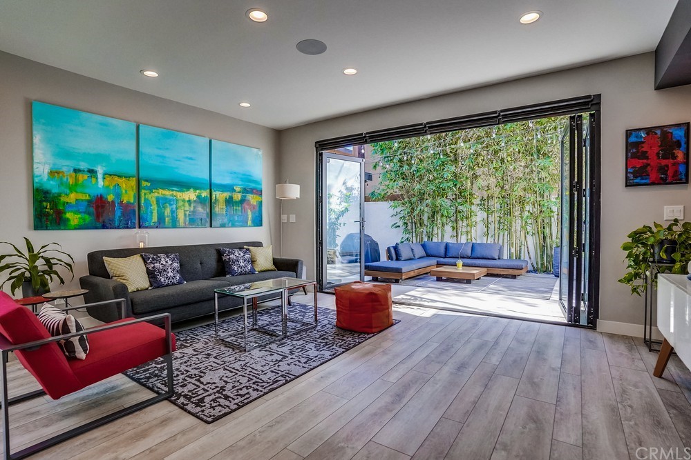 1051 Prospect Avenue Long Beach, CA 90804 - Photo 3 of 56 a living room with furniture and a large window