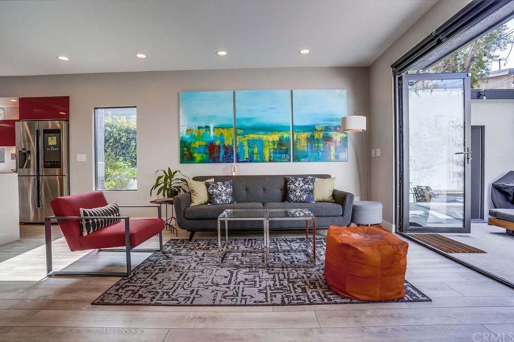 1051 Prospect Avenue Long Beach, CA 90804 - Photo 21 of 56 a living room with furniture and a large window