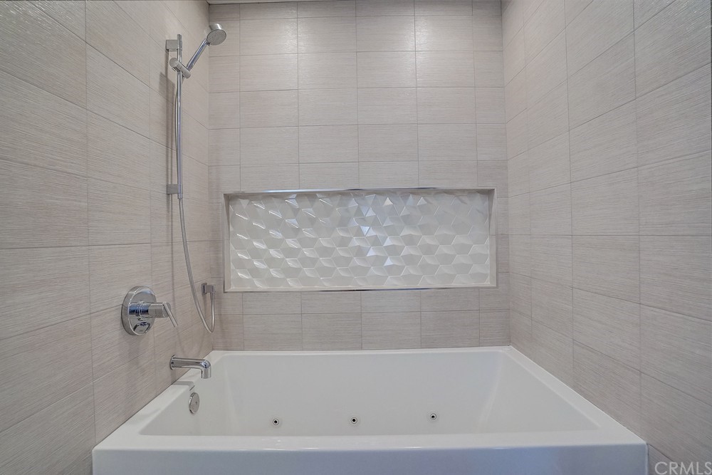 1051 Prospect Avenue Long Beach, CA 90804 - Photo 37 of 56 a close up of a bathtub in a bathroom