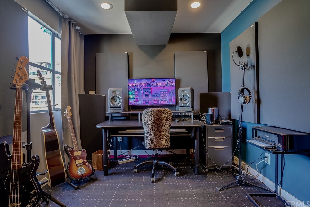 1051 Prospect Avenue Long Beach, CA 90804 - Photo 40 of 56 a work room with furniture and musical instruments