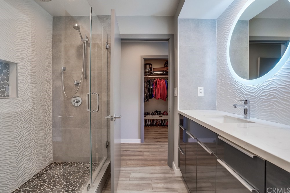 1051 Prospect Avenue Long Beach, CA 90804 - Photo 45 of 56 a bathroom with a sink and a mirror