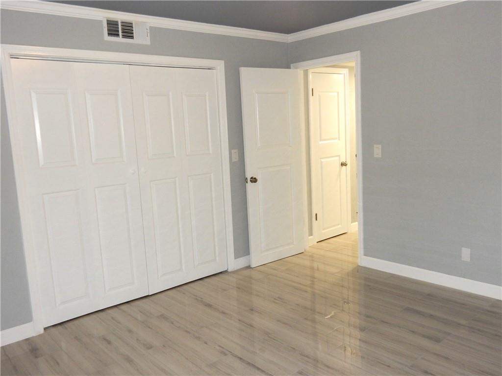 3083 Colonial Way, Unit N Atlanta, GA 30341 - Photo 13 of 20 a view of an empty room with wooden floor