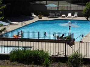 3083 Colonial Way, Unit N Atlanta, GA 30341 - Photo 14 of 20 a view of a porch with a chairs