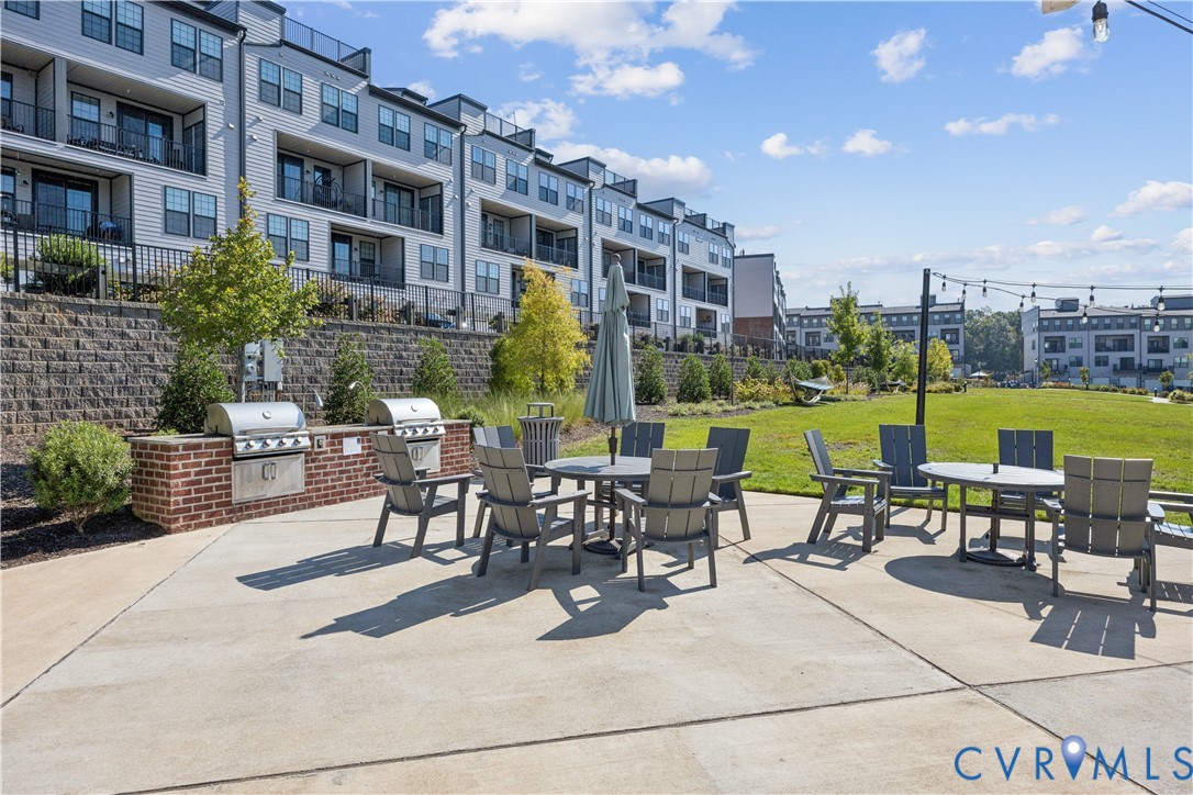 13121 Brattice Loop Midlothian, VA 23114 - Photo 36 of 43 a view of a patio with chairs and plants