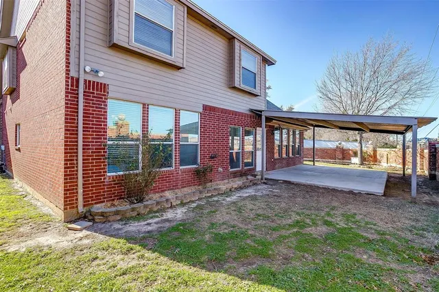 a view of an empty room with a floor to ceiling window