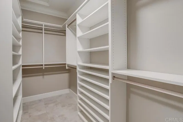 a view of an empty walk in closet