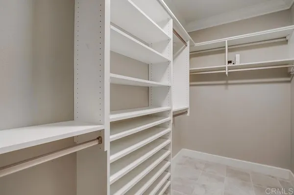 a view of an empty walk in closet