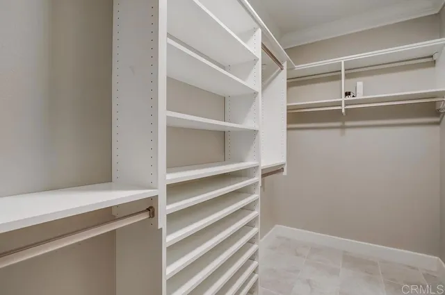a view of an empty walk in closet