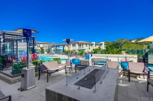 a view of a chairs and table in the patio
