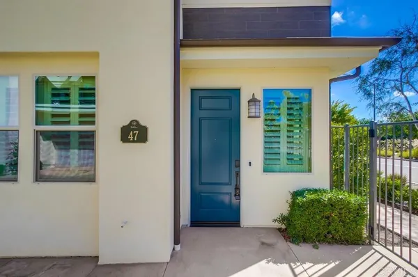 a view of entrance with a house