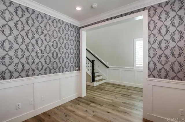 a view of entryway with wooden floor