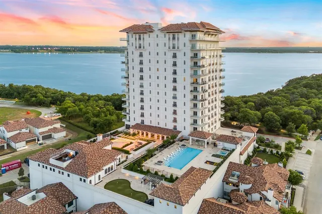 a view of a city with a lake