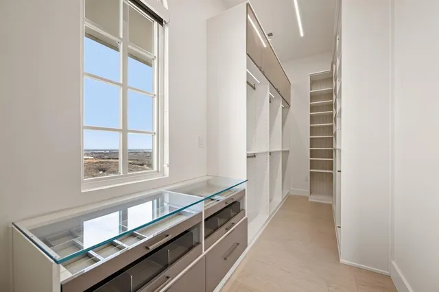 view of living room with furniture and floor to ceiling window