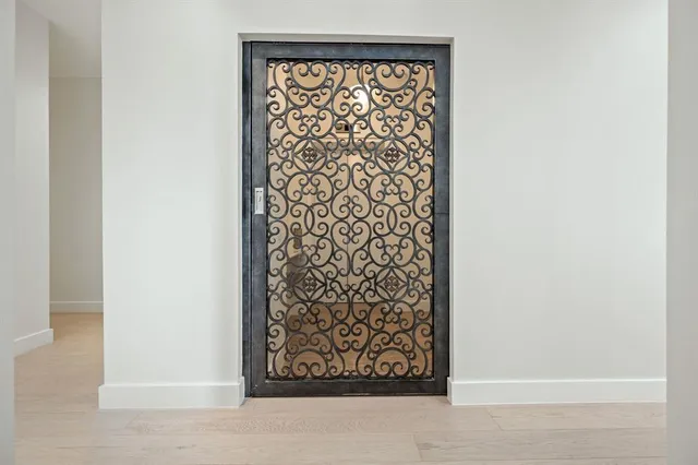 a view of a hallway with a large window