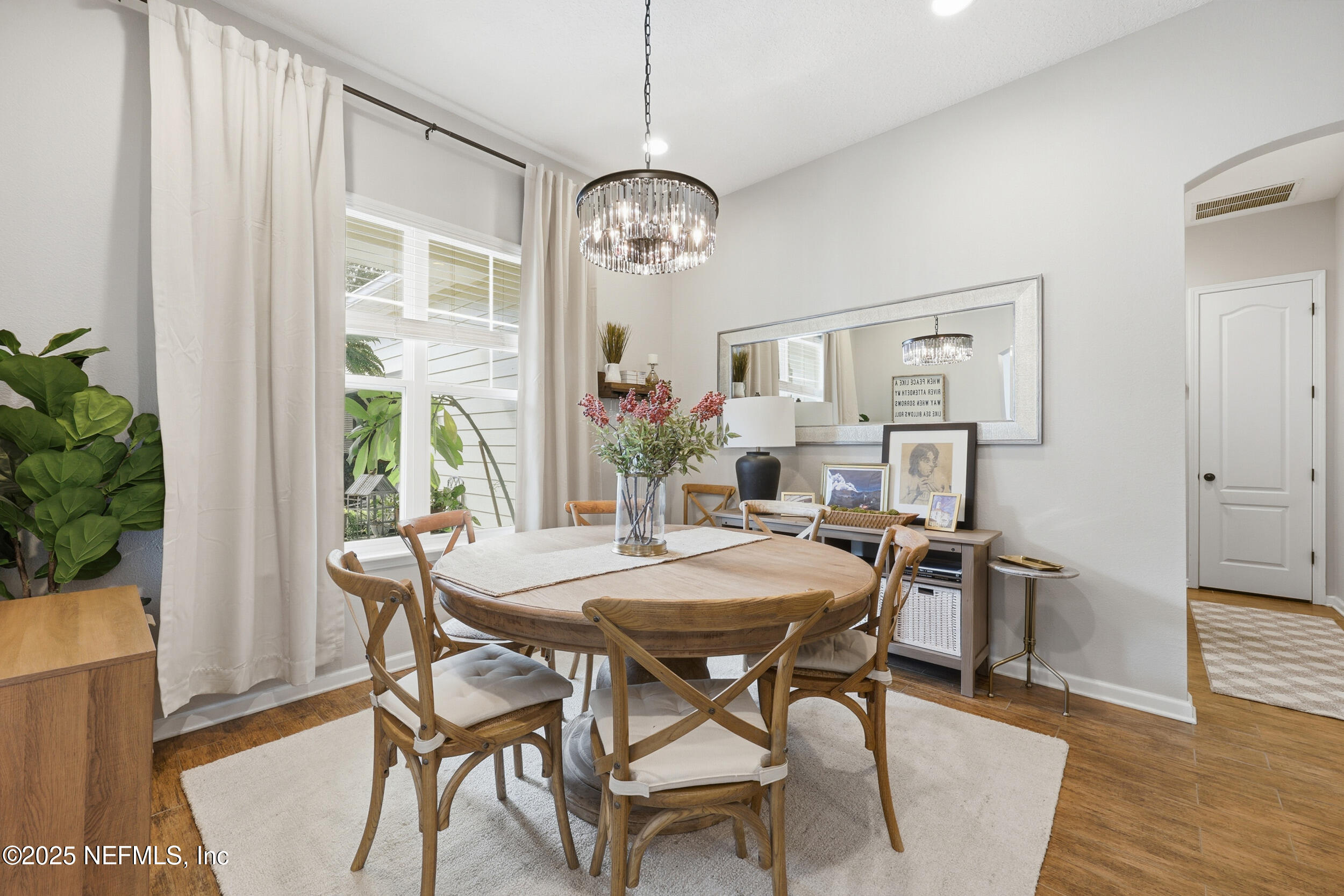 50 Olivette Street St. Johns, FL 32259 - Photo 23 of 74 a view of a dining room with furniture window and wooden floor