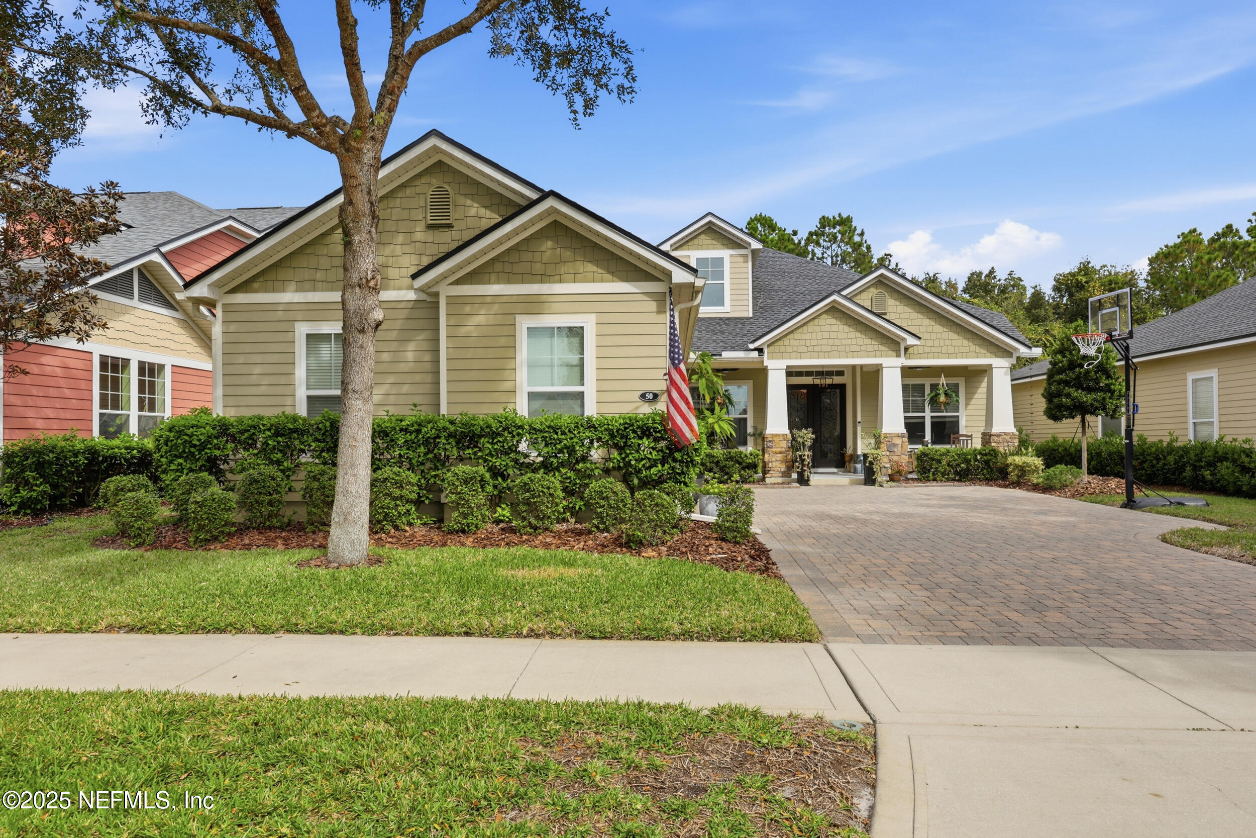 50 Olivette Street St. Johns, FL 32259 - Photo 3 of 74 a front view of a house with a yard