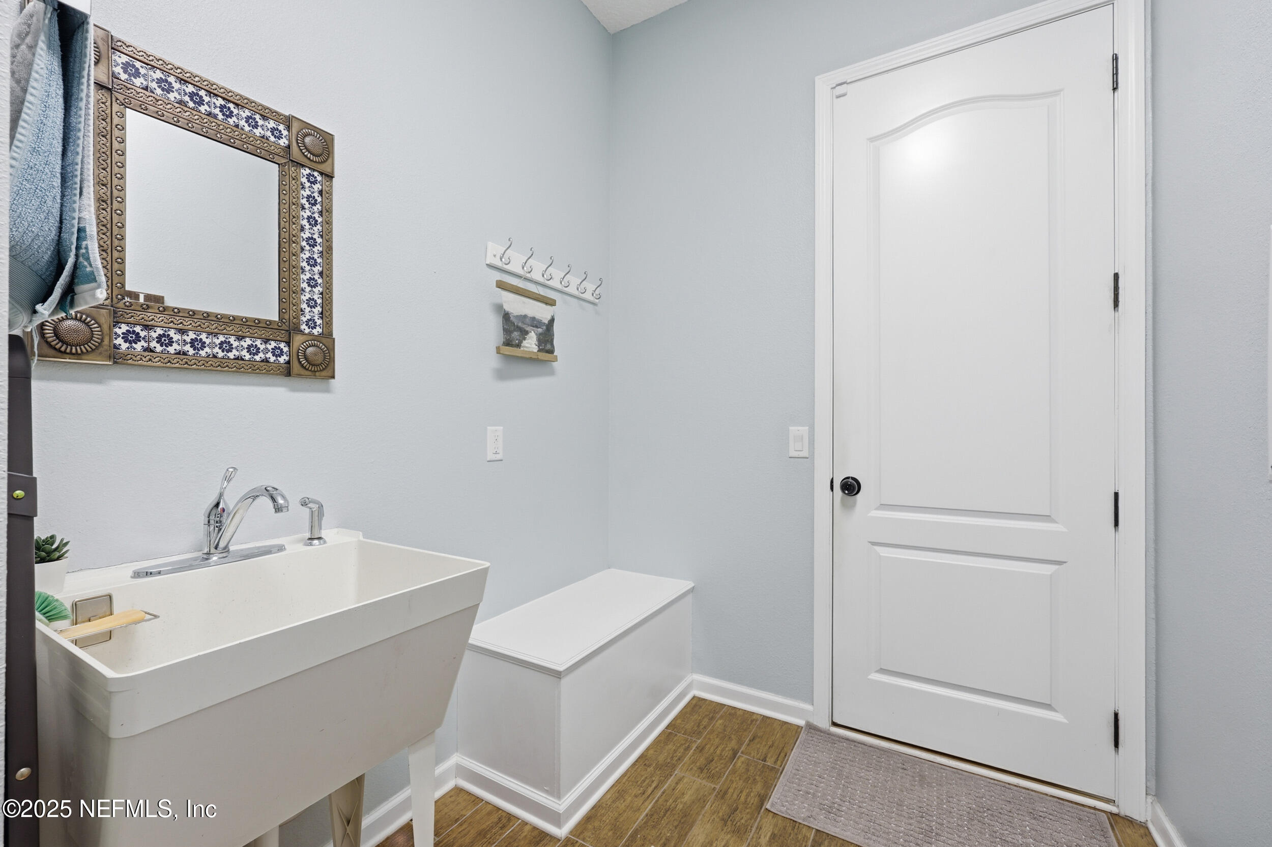 50 Olivette Street St. Johns, FL 32259 - Photo 45 of 74 a bathroom with a sink a mirror and a toilet