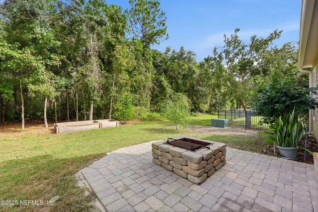 a front view of a house with yard and porch