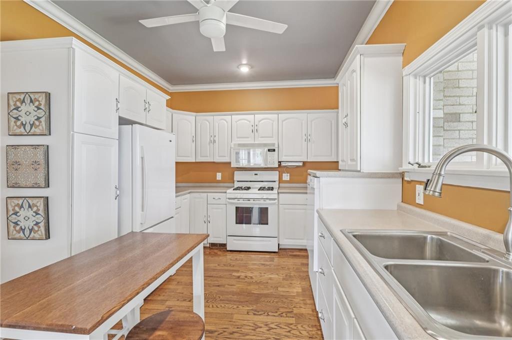 807 Kaye Avenue Monaca, PA 15061 - Photo 17 of 41 a kitchen with stainless steel appliances granite countertop a sink a stove and a refrigerator
