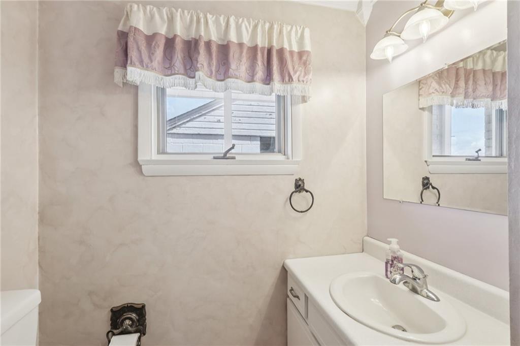 807 Kaye Avenue Monaca, PA 15061 - Photo 20 of 41 a bathroom with a sink and a mirror