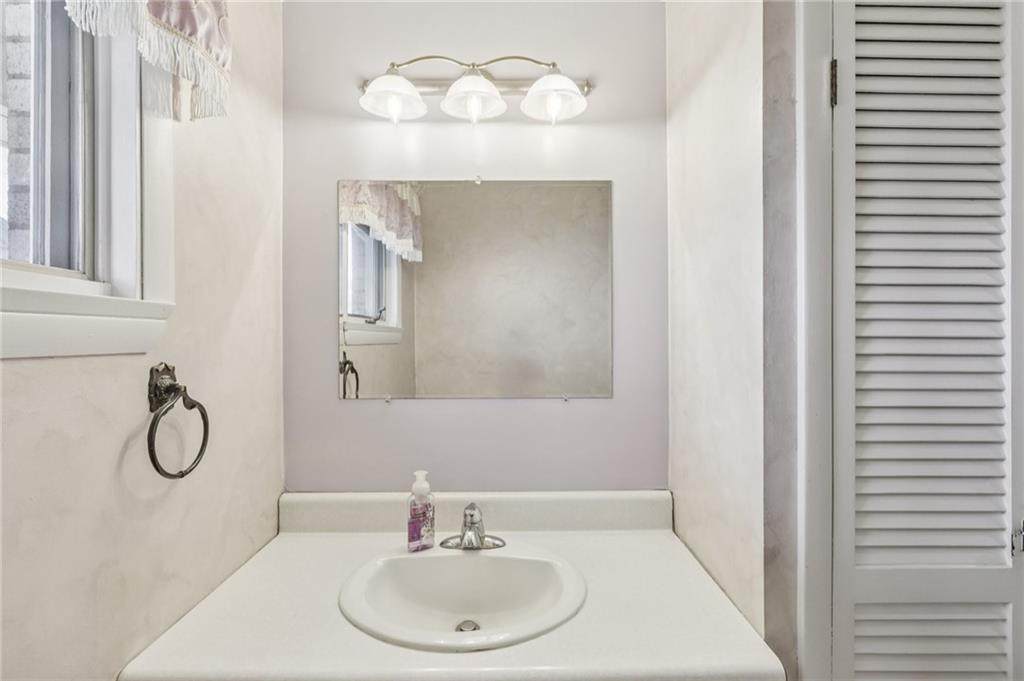 807 Kaye Avenue Monaca, PA 15061 - Photo 21 of 41 a bathroom with a sink and a mirror