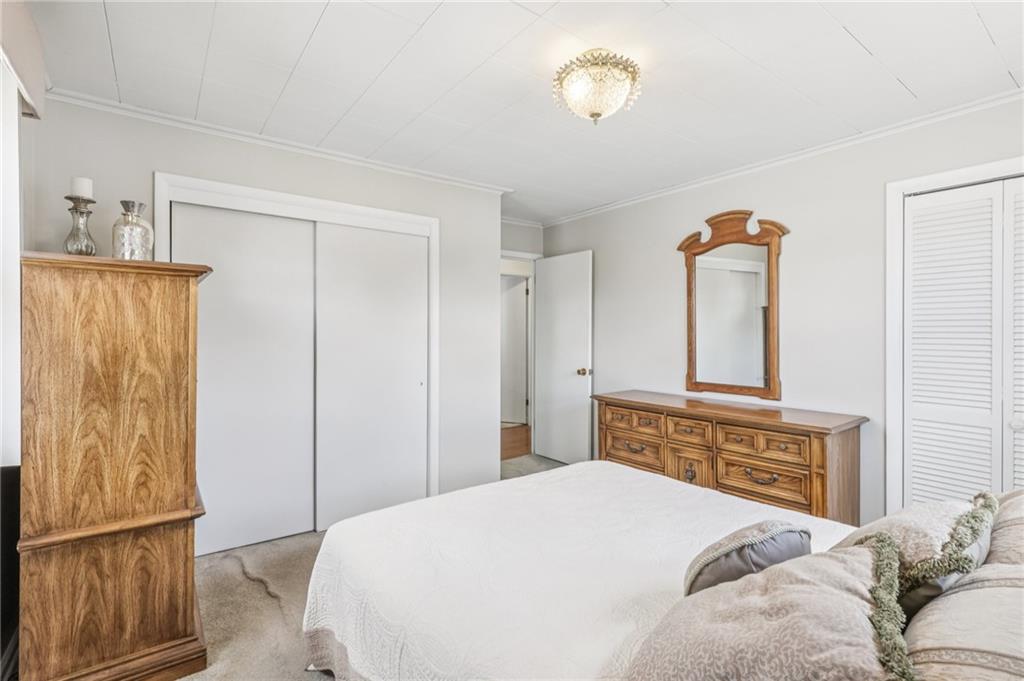 807 Kaye Avenue Monaca, PA 15061 - Photo 23 of 41 a bedroom with a bed and a dresser