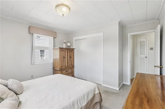 a bathroom with a sink toilet and mirror