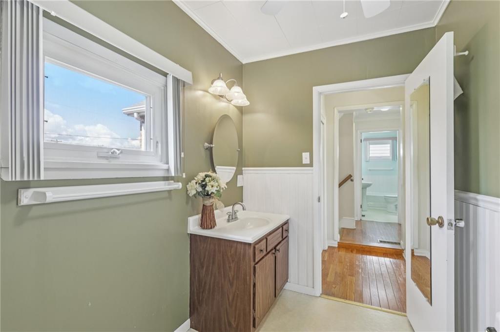807 Kaye Avenue Monaca, PA 15061 - Photo 33 of 41 a en suite bathroom with a sink vanity and mirror