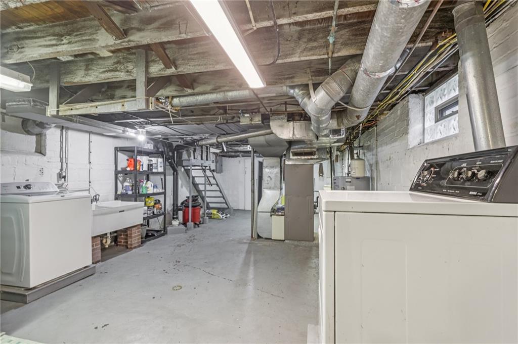 807 Kaye Avenue Monaca, PA 15061 - Photo 35 of 41 a view of storage and utility room with racks on the wall