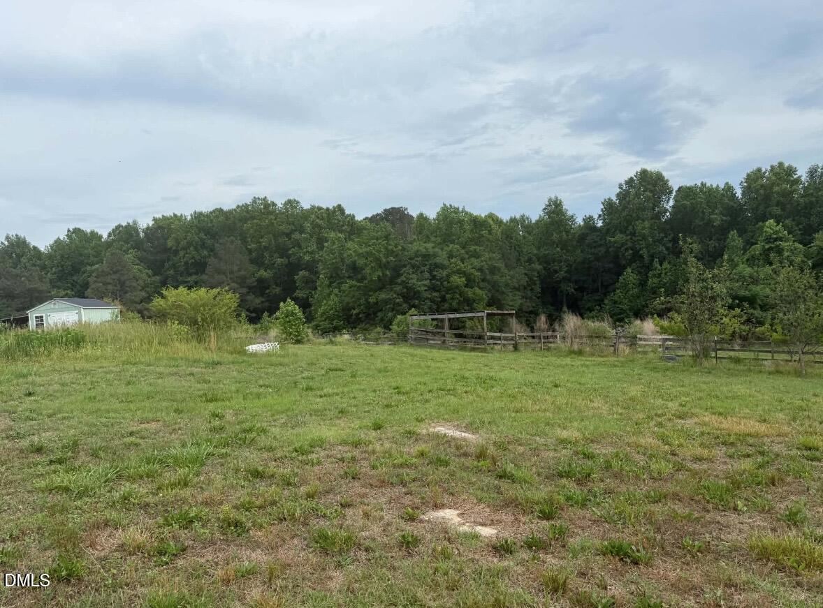 344 J B Leonard Road Castalia, NC 27816 - Photo 21 of 32 a backyard of a house with lots of green space